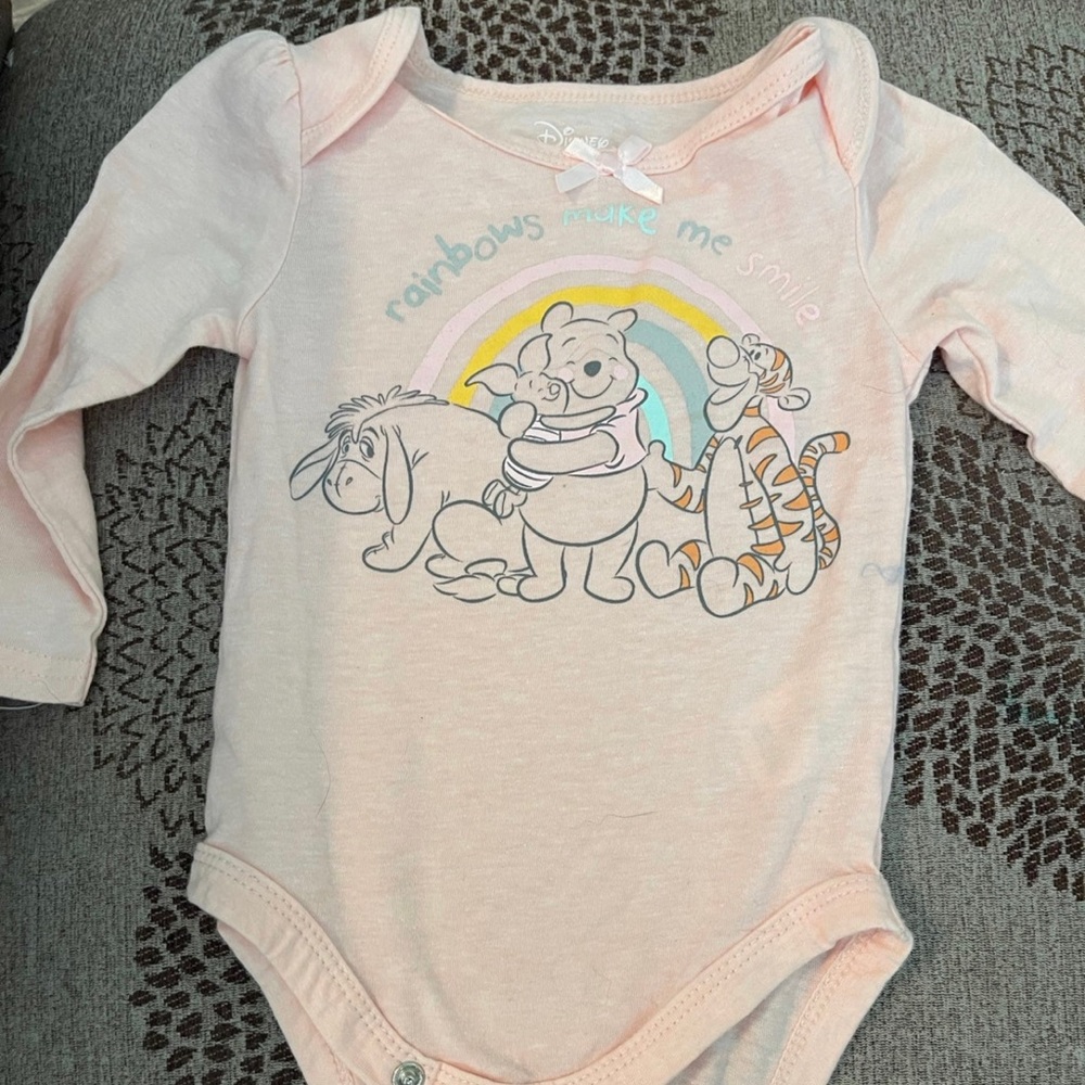 Disneys Winnie the Pooh onesie and additional onesie
